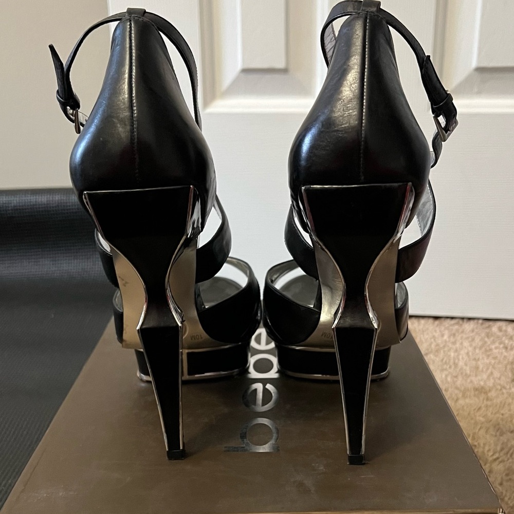 BeBe black and silver high heel stunner shoe. In size 10